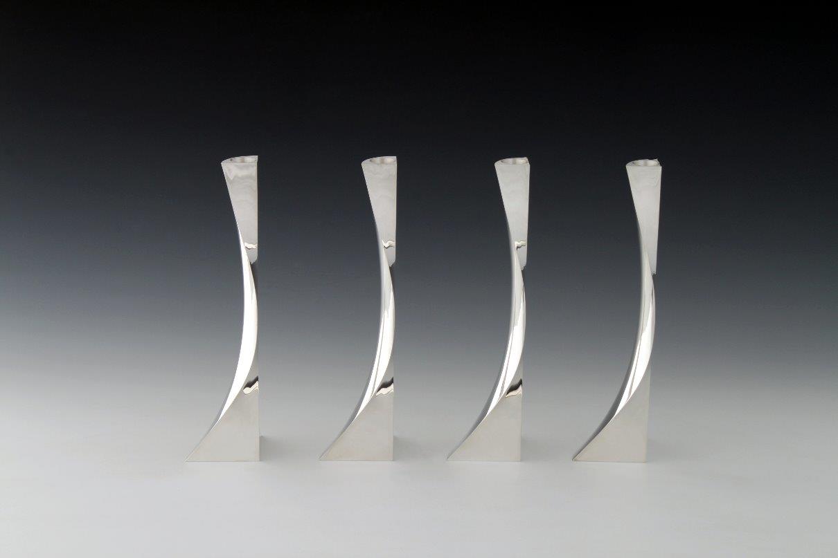 Sterling silver candlesticks Fourfold round, designed and executed by silversmith Wouter van Baalen, Amsterdam 2009